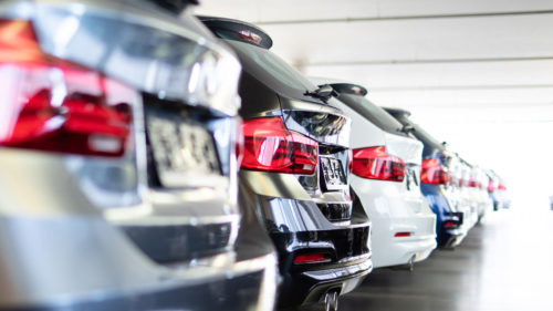 Row of cars in showroom