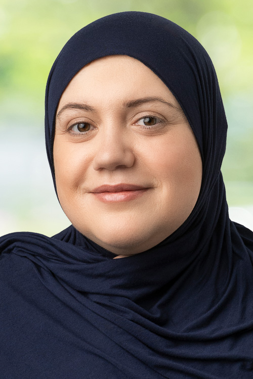 Headshot of Jenet Shomshe