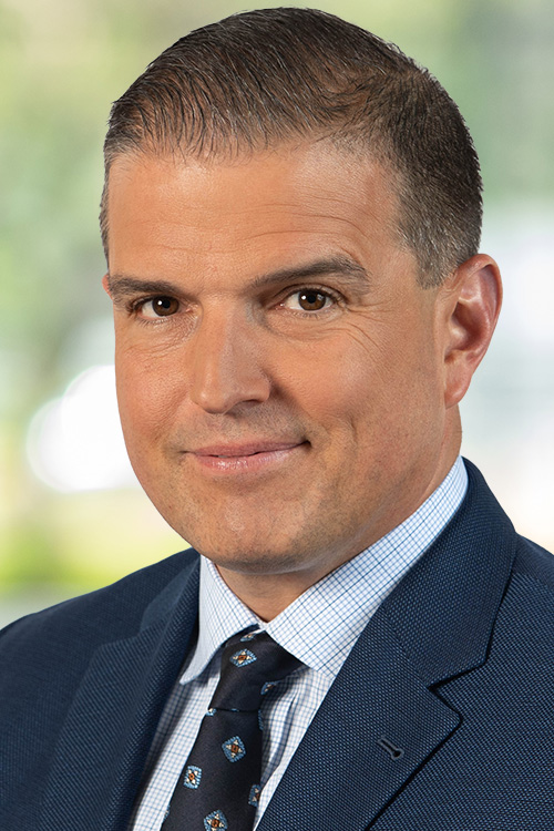 Headshot of Justin Psaki